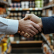 Partnerschaft Getränkemarkt Adobe Stock